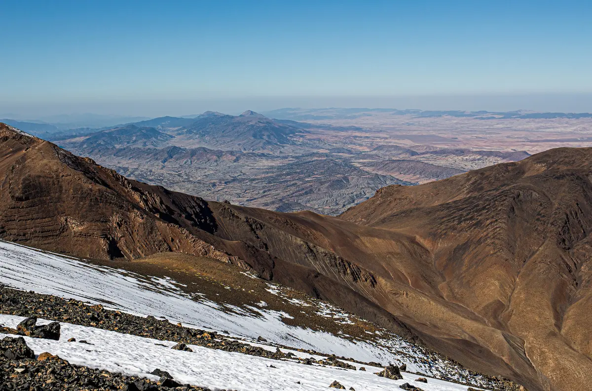 The High Atlas ridgeline with early snow on the peaks