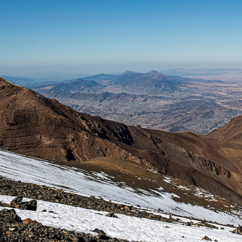 The High Atlas ridgeline with early snow on the peaks