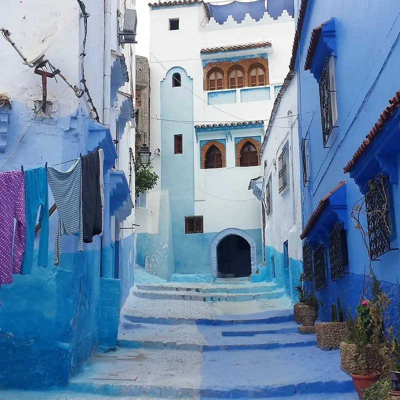 Blue-washed lanes climbing through the Chefchaouen medina