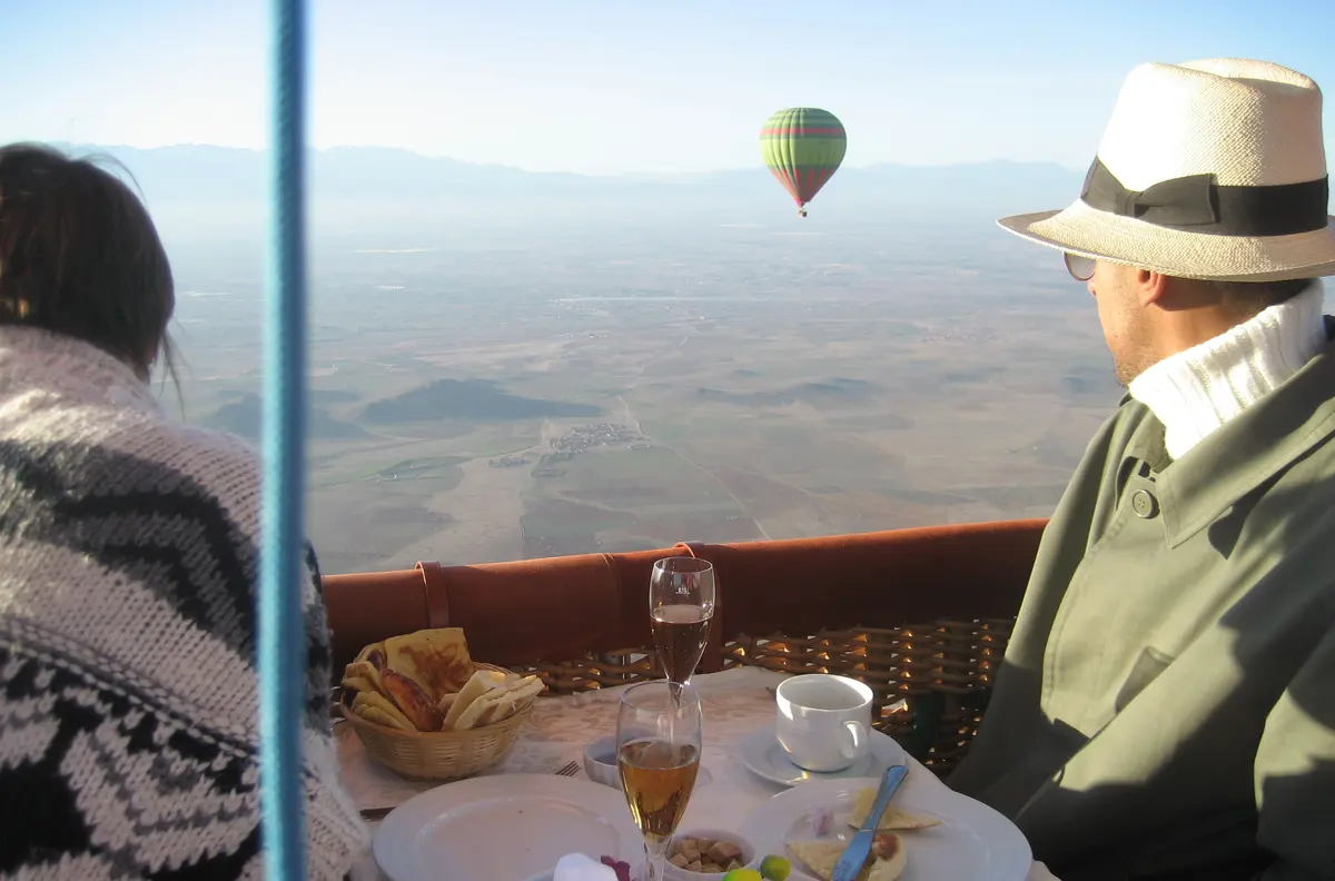 A balloon flight over the palm groves at dawn