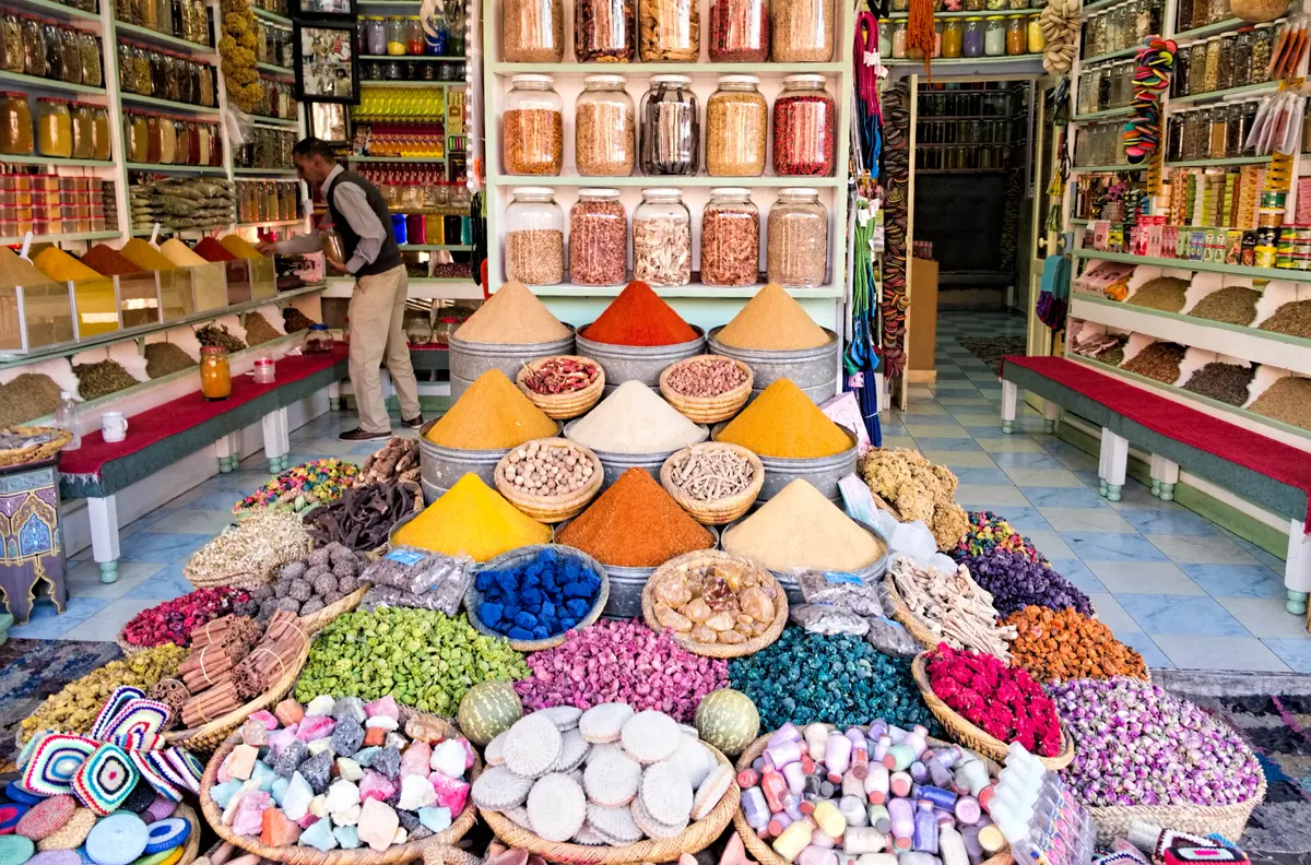 Spice pyramids stacked in a Marrakech souk